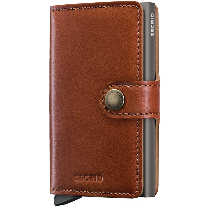 Secrid Texano Miniwallet with saddle-colored leather front view showing compact design and card slots.