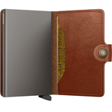 Secrid Texano Miniwallet made of premium leather, featuring compact design with card slots and sleek stitching.
