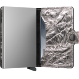 Secrid Miniwallet Crunch in silver with compact design and card slots, showcasing its sleek, minimalist style.