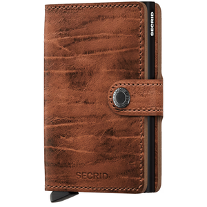 Secrid Miniwallet Dutch-Martin in whiskey leather, front view showing compact design and elegant craftsmanship.