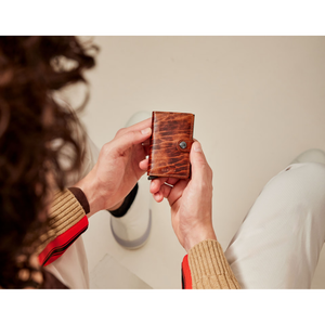 Secrid Miniwallet Dutch Martin in whiskey leather, featuring a compact design with card slots and stylish craftsmanship.