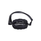 Black Sol & Selene quilted nylon crossbody bag with a sleek design, featuring a compact shape and adjustable strap.