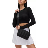 Black Sol & Selene Inspiration quilted nylon crossbody bag with adjustable strap and sleek design.