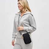 Black quilted Sol & Selene Divide & Conquer crossbody bag with adjustable strap and sleek design.