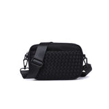 Black woven neoprene crossbody bag by Sol & Selene with a sleek, modern design and adjustable strap.