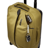 Thule Aion carry-on spinner luggage with four wheels, durable hard shell, and integrated handle for easy travel.