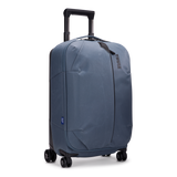 Thule Aion carry-on spinner luggage with four wheels, durable hard shell, and retractable handle for easy travel.
