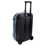 Thule Chasm wheeled carry-on duffel bag with durable fabric, multiple compartments, and retractable handle for easy travel.
