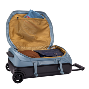 Thule Chasm wheeled carry-on duffel bag with durable fabric and retractable handle, ideal for travel and weekend trips.