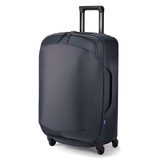 Black Thule Subterra 2 checked spinner luggage with 65L capacity, featuring durable wheels and a sleek, hard-shell design.