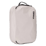 Thule clean and dirty packing cube set with multiple compartments for organized travel storage, in durable fabric.