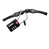 Thule TSA cable lock with key for securing luggage and travel gear, featuring a durable cable and TSA-approved design.