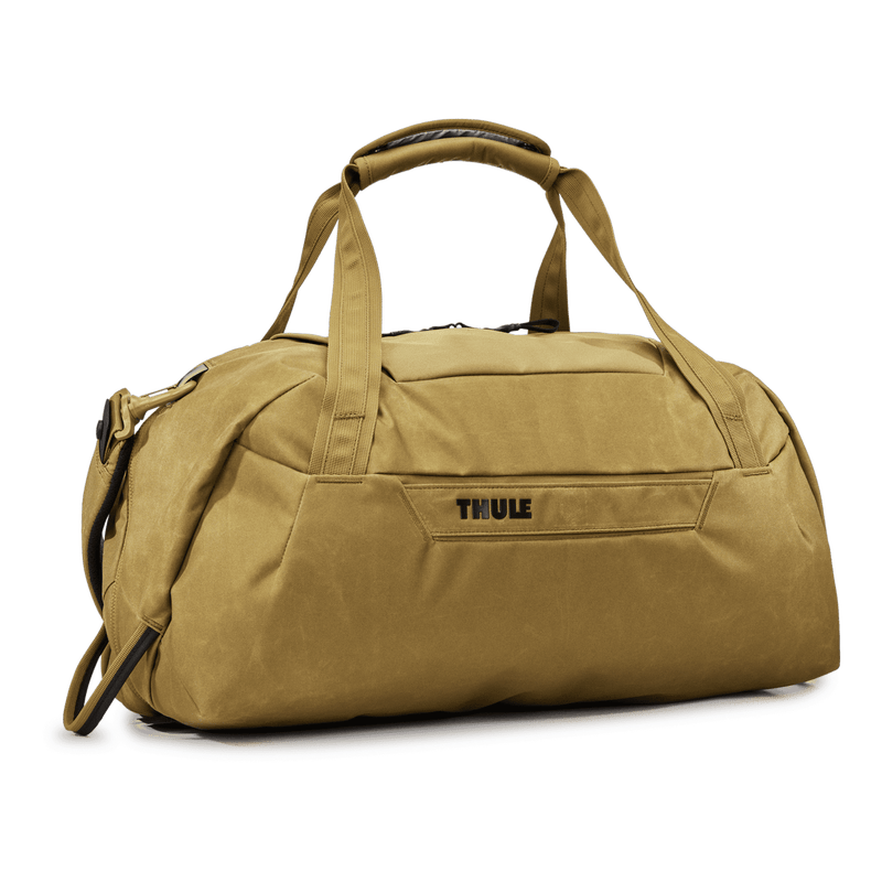 Thule Aion 35L duffel bag in nutria color with sturdy handles and zipper closure, designed for travel and outdoor use