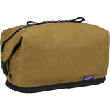 Thule Aion toiletry bag in black with multiple compartments and zipper closures, designed for travel organization.