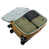 Thule Compression Cube Set packing organizers in white for efficient packing and travel organization.