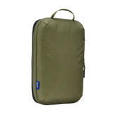White Thule Compression Cube Set packing organizers for efficient travel storage and clothing organization.