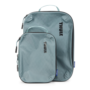 Thule Compression Cube Set packing organizers with multiple mesh compartments for efficient luggage packing and organization.