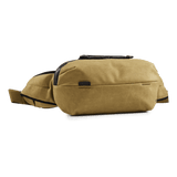 Thule Aion sling bag with adjustable strap, compact design, and multiple compartments for everyday carrying.