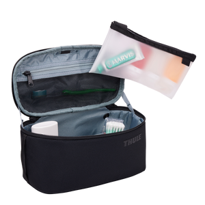 Black Thule Subterra 2 toiletry bag with multiple compartments and zipper closure, designed for travel organization.