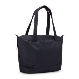Thule Subterra 2 tote bag with black fabric, multiple compartments, and sturdy handles for versatile everyday use.
