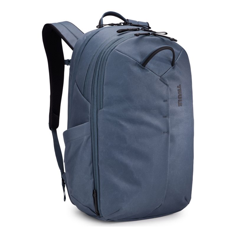 Thule Aion 28L travel backpack in Nutria color with multiple compartments and padded shoulder straps for comfortable travel.