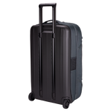 Thule Subterra 2 wheeled duffel bag with 90L capacity, durable black nylon exterior and large wheels for easy travel.