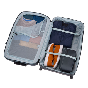 Thule Subterra 2 90L wheeled duffel bag with sturdy wheels and adjustable handle, designed for durable travel storage.