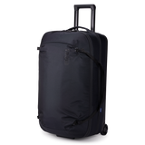 Thule Subterra 2 wheeled duffel bag in black, 90L capacity with wheels and a sturdy handle for easy transport.