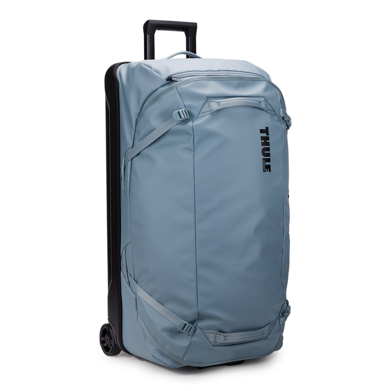 Thule Chasm wheeled checked duffel bag with sturdy wheels, large main compartment, and durable fabric for travel.