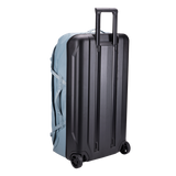 Thule Chasm wheeled checked duffel bag with durable fabric and large wheels for easy travel and luggage handling.
