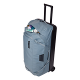 Thule Chasm wheeled checked duffel bag with durable fabric and sturdy wheels, designed for travel and easy handling.