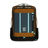 Topo Designs Global Travel Bag 30L backpack in desert palm and pond blue, front view showing durable fabric and zip compartments.