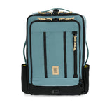 Front view of Topo Designs Global Travel Bag 30L in Sea Pine, a durable backpack with multiple compartments for travel essentials.