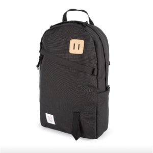 Topo Designs Daypack Classic backpack with adjustable straps and multiple compartments, made of durable fabric.