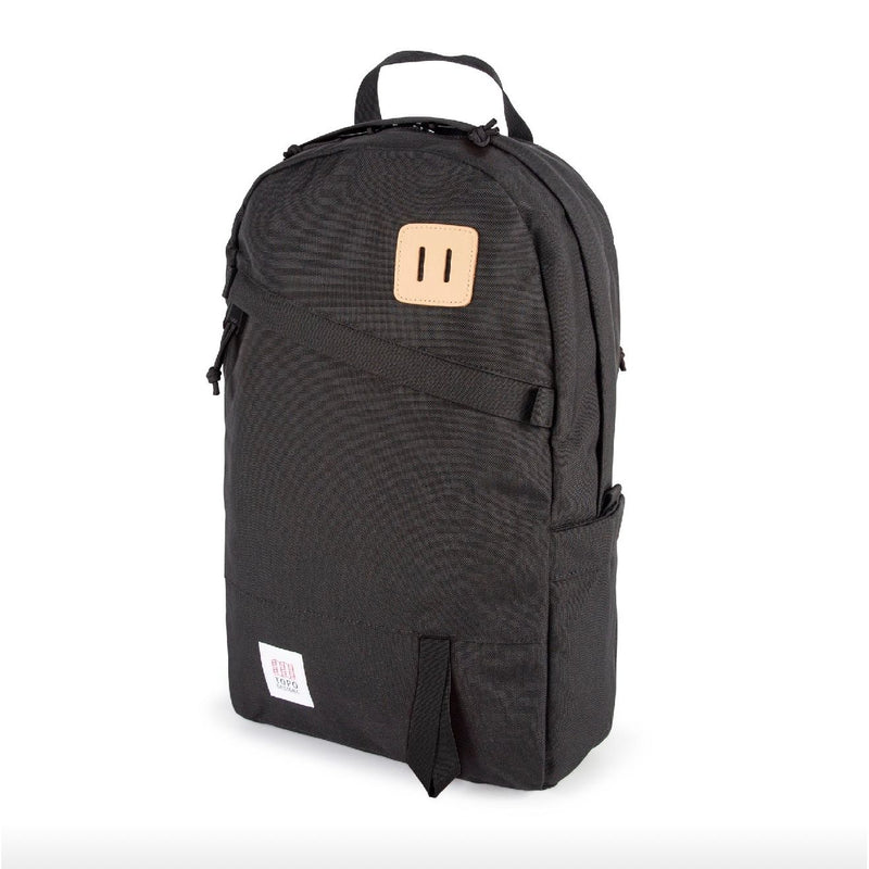 Topo Designs Daypack Classic backpack with adjustable straps and multiple compartments, made of durable fabric.