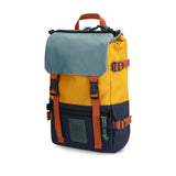 Topo Designs Rover Pack Mini backpack in recycled navy and mustard, with adjustable straps and multiple compartments.
