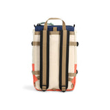 Topo Designs Rover Pack Mini backpack in almond and emberglow, featuring durable straps and compact design for everyday use.