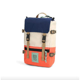 Topo Designs Rover Pack Mini backpack with adjustable straps, front pocket, and durable fabric in classic outdoor style.
