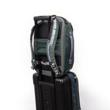 Topo Designs Global Travel Backpack with multiple compartments, adjustable straps, and durable fabric, shown from the front.