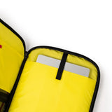 Topo Designs Global Travel Backpack in durable fabric with multiple compartments, shown with adjustable straps and padded back panel.