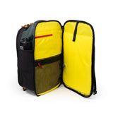Topo Designs Global Travel Backpack shown with multiple compartments, durable fabric, and adjustable straps for versatile travel use