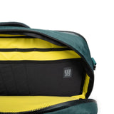 Topo Designs Global Pro 3-Way Briefcase in large view, showing durable fabric, multiple compartments, and adjustable straps.