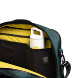 Topo Designs Global Pro 3-Way Briefcase shown in large view, featuring durable fabric, multiple compartments, and adjustable straps.