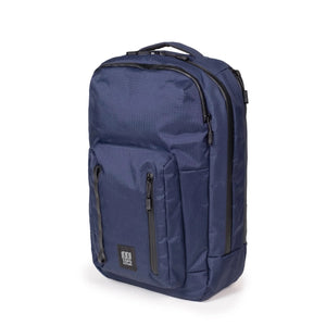 Topo Designs Global Pro Backpack with multiple compartments and padded straps, shown in a large view.
