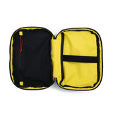 Topo Designs Global Pro Tech Case in black, showing the durable, compact protective laptop and tech accessories case with logo detail.