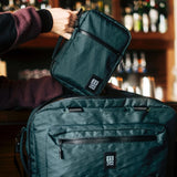 Topo Designs Global Pro Tech Case shown with durable black fabric, zipper closure, and compact design for tech accessories.