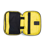 Topo Designs Global Pro Tech Case in black with zipper closure and logo patch, designed for durable tech storage.
