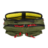 Olive green Topo Designs Global Briefcase with leather details, showing front view and functional compartments.