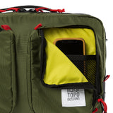 Olive green Topo Designs Global Briefcase with leather accents, featuring multiple compartments and a sturdy handle.