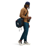 Topo Designs Global Briefcase in khaki and navy, showing detailed view of the durable fabric and sleek design.